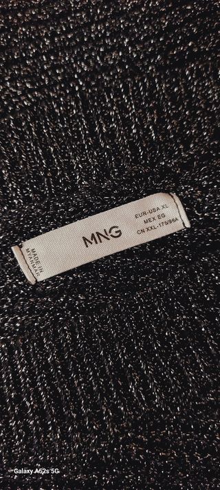 Top asimétrico negro plata