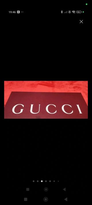 Caja y bolsa Gucci