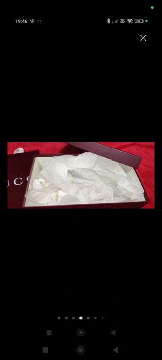 Caja y bolsa Gucci