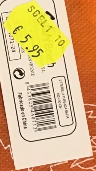 Alfombra playa rayas naranja y blanca.