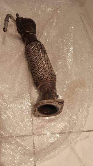 Tubo escape Kia Carens