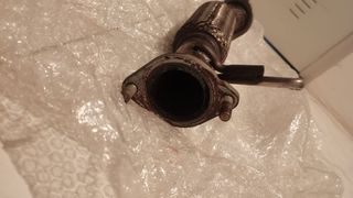 Tubo escape Kia Carens