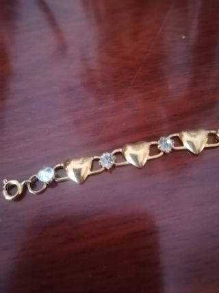 Pulsera corazones oro