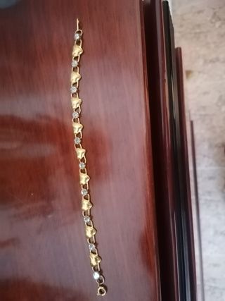Pulsera corazones oro