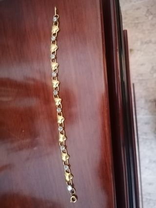 Pulsera corazones oro