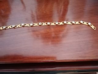 Pulsera corazones oro