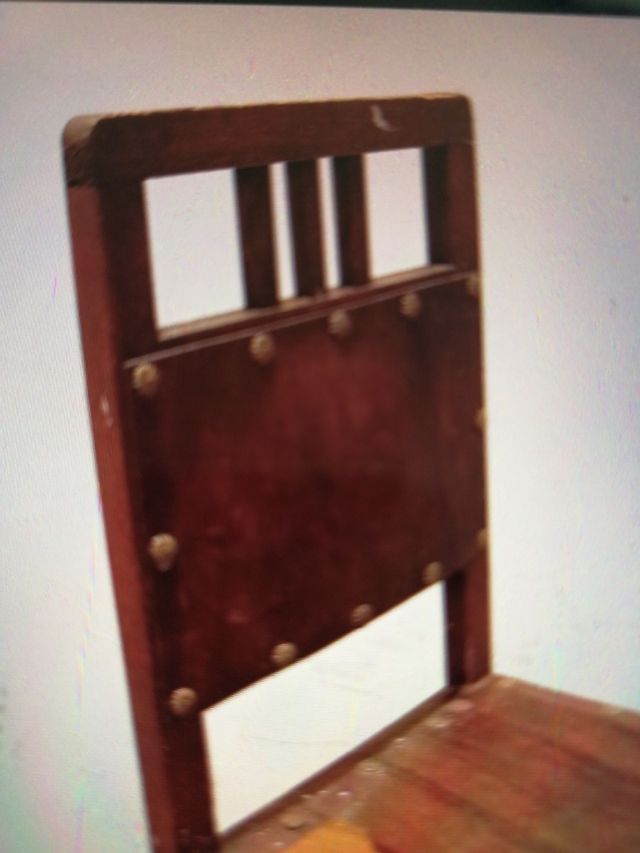 Sedia antica in legno e pelle