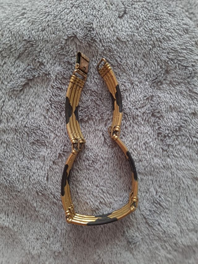 Pulsera de los 70s, color oro y negro