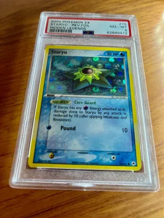 🧢⭕ Carta Pokemon 2004 Staryu 👉 PSA 8