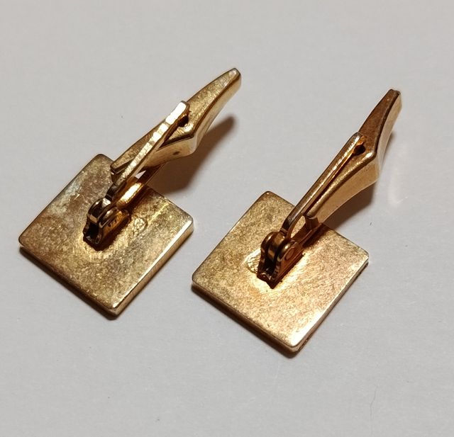 Gemelos dorados antiguos