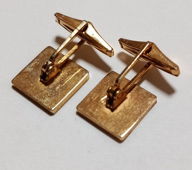 Gemelos dorados antiguos