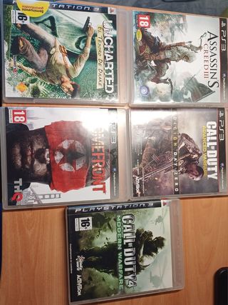 PS3 (PlayStation 3) con 2 mandos y 2 juegos