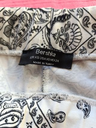 Pantalones campana blanco-negro