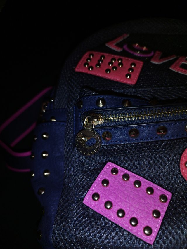 Mochila mini negra con tachuelas