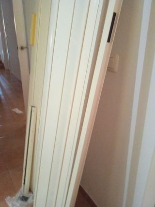 Puerta plegable PVC blanca