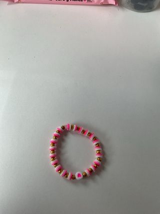 Pulsera de cuentas dorada ,rosa y blanca