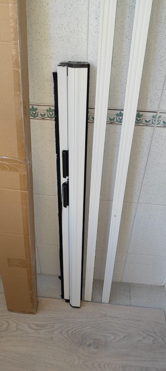 Mosquitera enrollable aluminio ventana