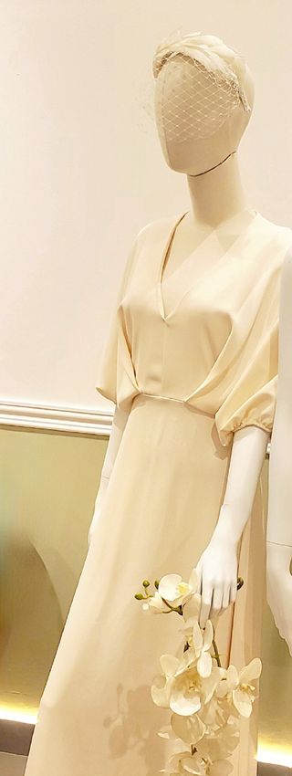 Tocado novia plumas blancas