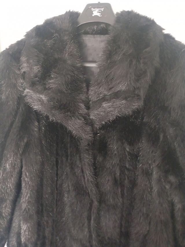 Cappotto lungo in pelliccia nera