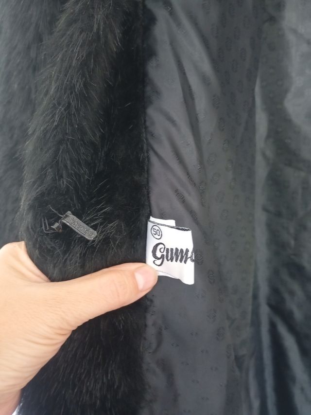 Cappotto lungo in pelliccia nera