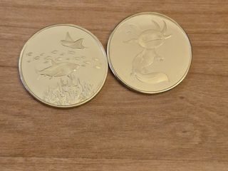 Medallas Atlantis: Tiburón & Ajolote.