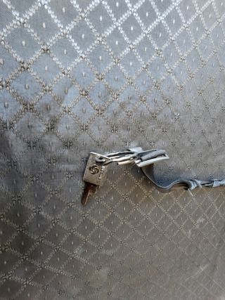 Maleta Samsonite vintage negra y marrón