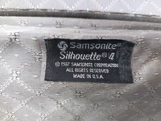 Maleta Samsonite vintage negra y marrón