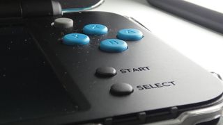 Nintendo 2DS XL negra y azul
