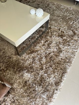 Alfombra beige pelo