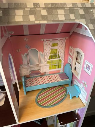 Casa de muñecas de madera