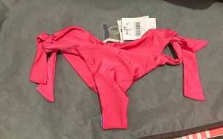 Bikini rosa con lazos