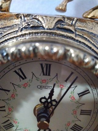 Reloj de bronce con jinete