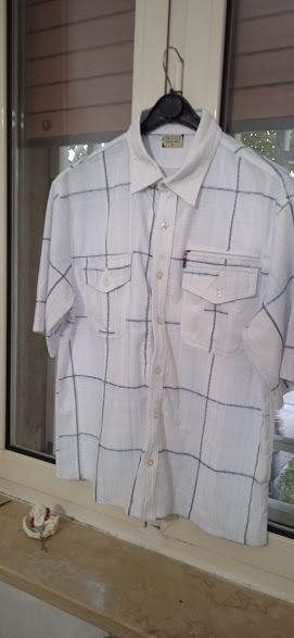 camicia uomo a quadri come da foto  cerniera tasca