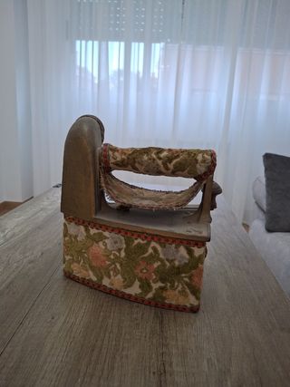 Plancha antigua de carbón