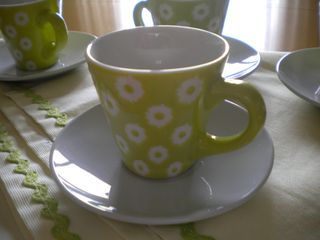 4 TAZZINE DECORATE IN RILIEVO+PIATTINO+1 CENTRO
