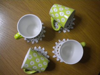 4 TAZZINE DECORATE IN RILIEVO+PIATTINO+1 CENTRO