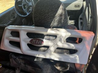 Portavasos Kia Sportage '98
