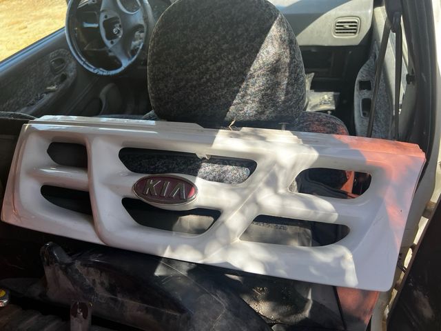 Portavasos Kia Sportage '98