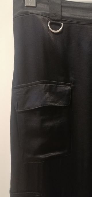Falda negra larga bolsillos laterales