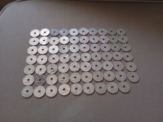 69 monedas 50 céntimos agujero 1963. Escucho ofert