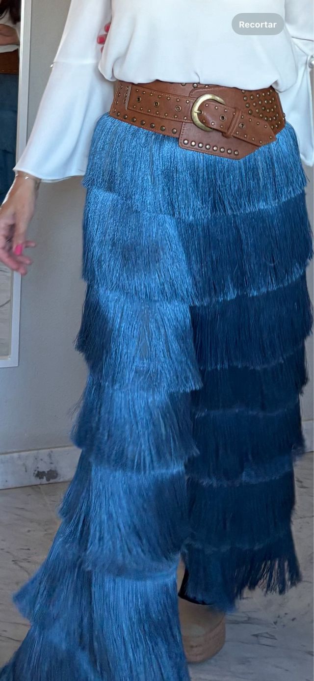 Pantalones azul con flecos