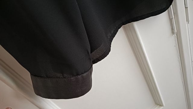 Blusa negra MERLETTI