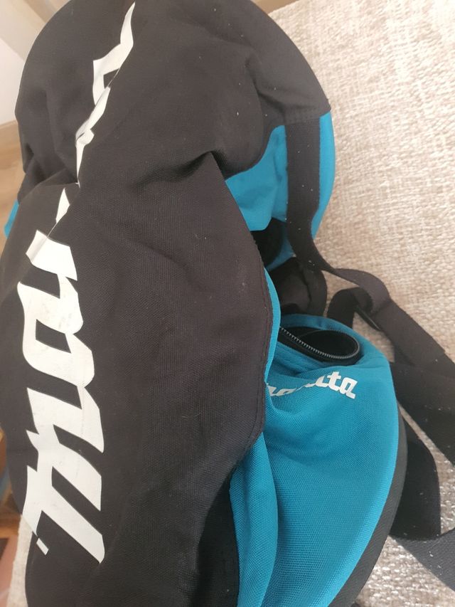 Bolsa Thrasher negra y verde azulado