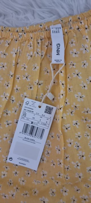 Blusa Mango amarilla XS, pero talla muy grande.