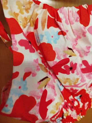 Dos conjuntos top y pantalón rojo y rosa