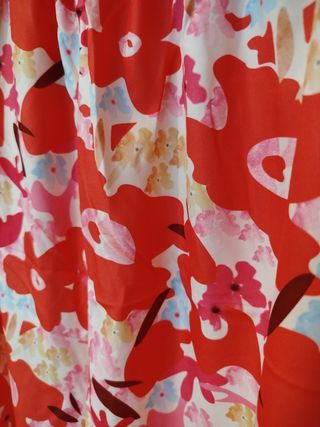 Dos conjuntos top y pantalón rojo y rosa