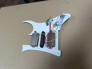 Golpeador guitarra zurda