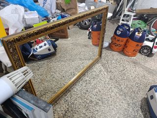 Espejo dorado antiguo