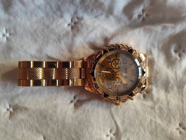 Reloj Elegante dorado