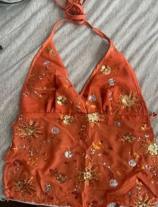 Top vintage anaranjado con lentejuelas
